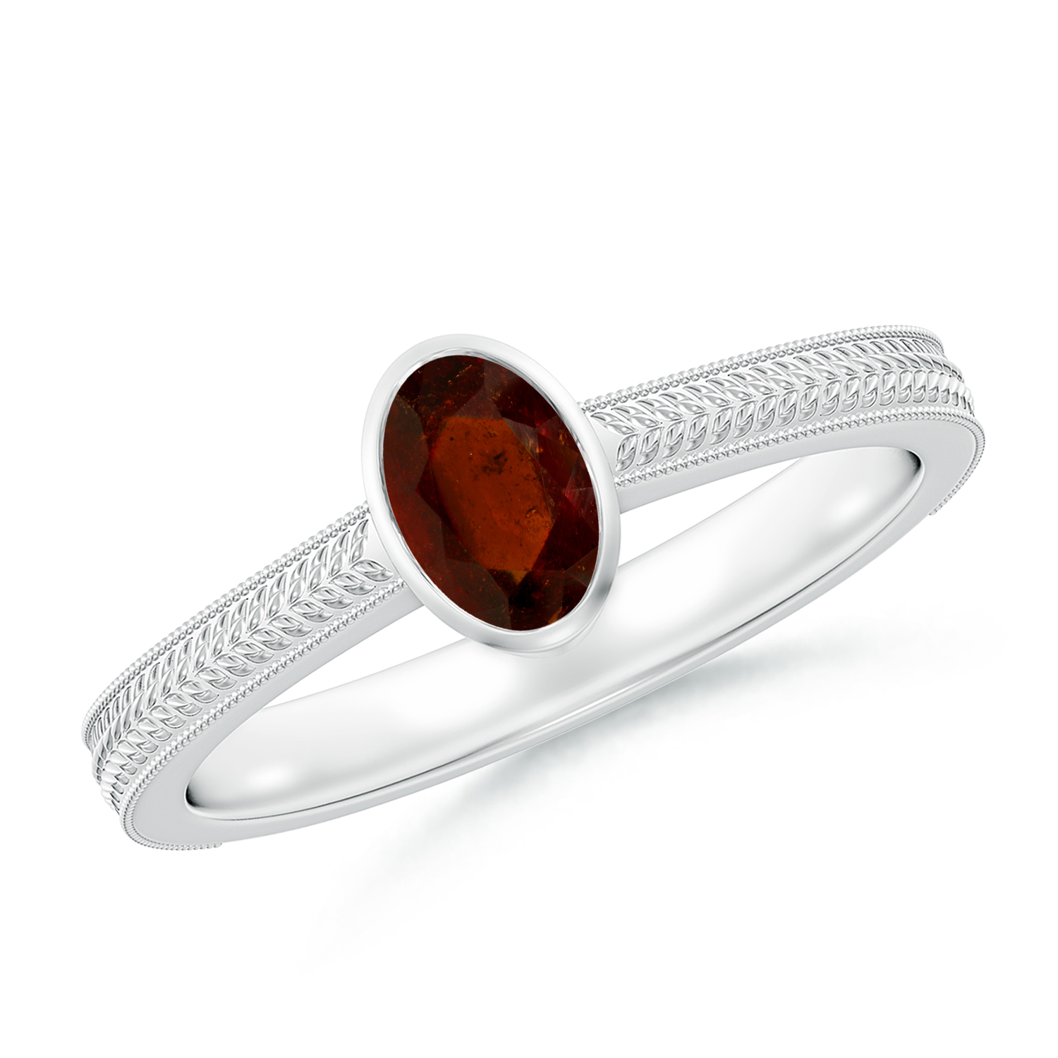 Peg-Set Oval Hessonite (Gomed) Feather Ring With Scrollwork